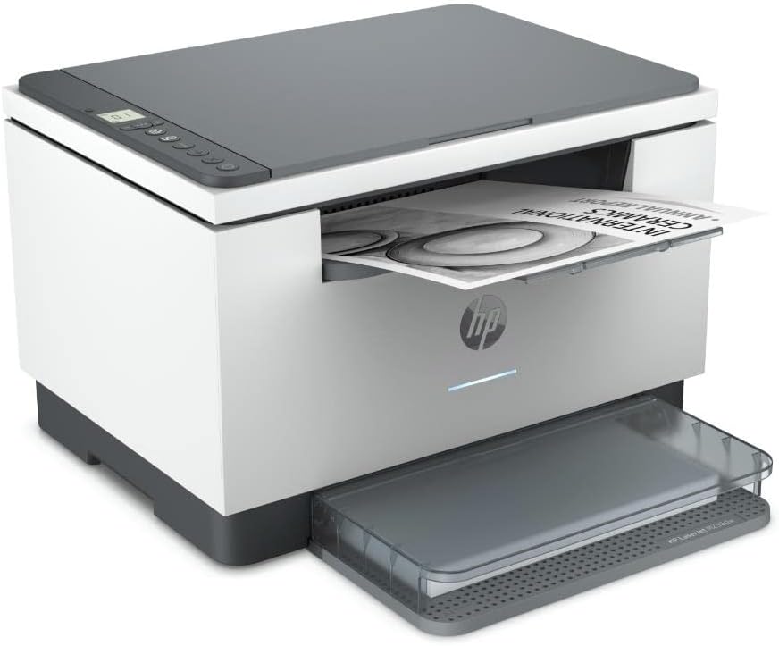 White HP laser multifunction printer with top open and cartridge showing, angled view