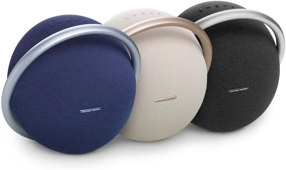 Three portable Bluetooth speakers: blue, champagne, and black with circular ring bodies