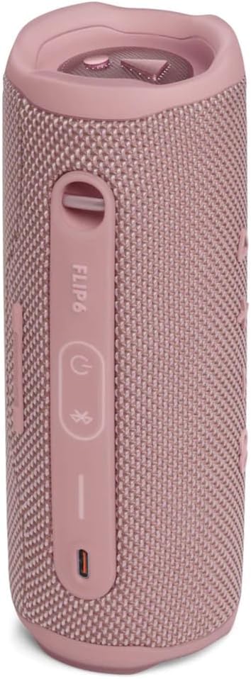 Portable Bluetooth speaker in pink, with top grille and control buttons on the side