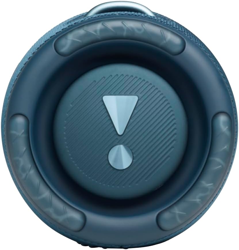 Blue speaker driver grille close-up with circular JBL-style emblem