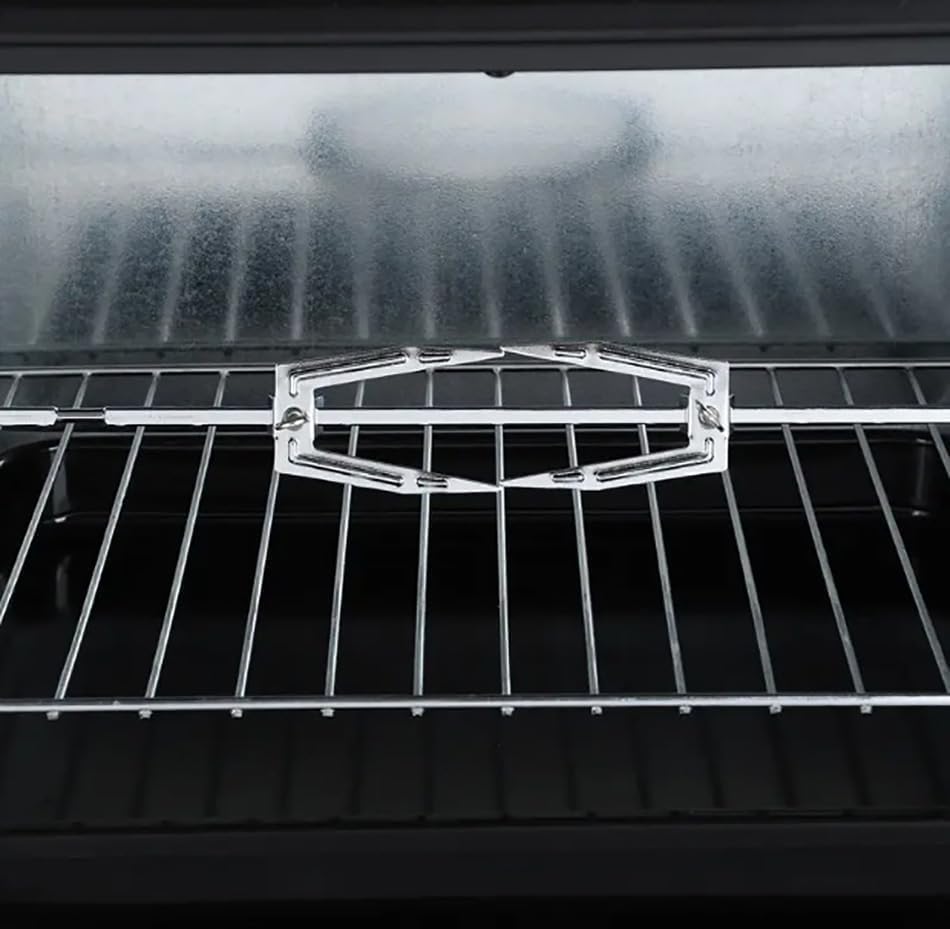 Oven interior with chrome rack and upper heating element above the cavity