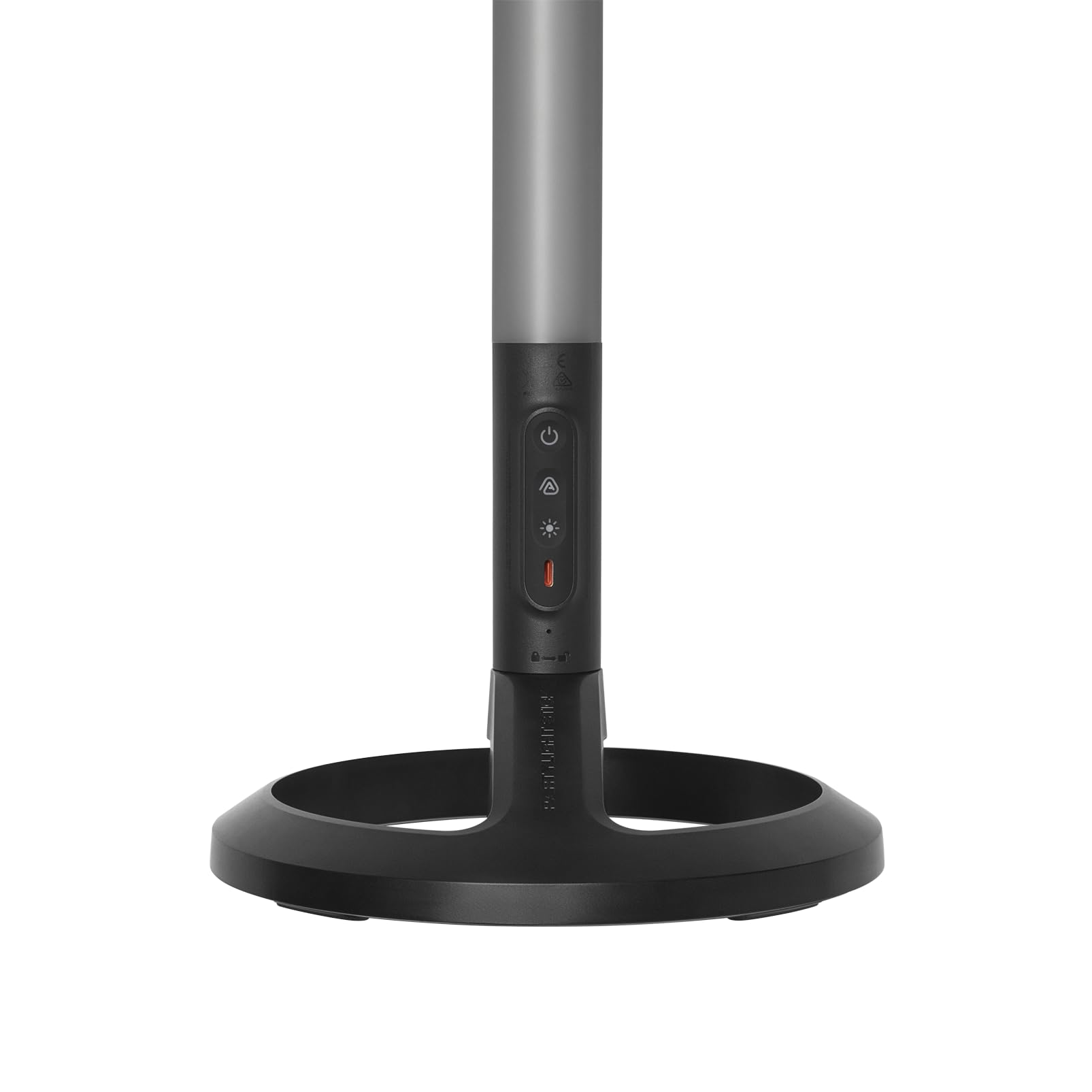 Portable Bluetooth speaker control panel on black base with power and mode icons
