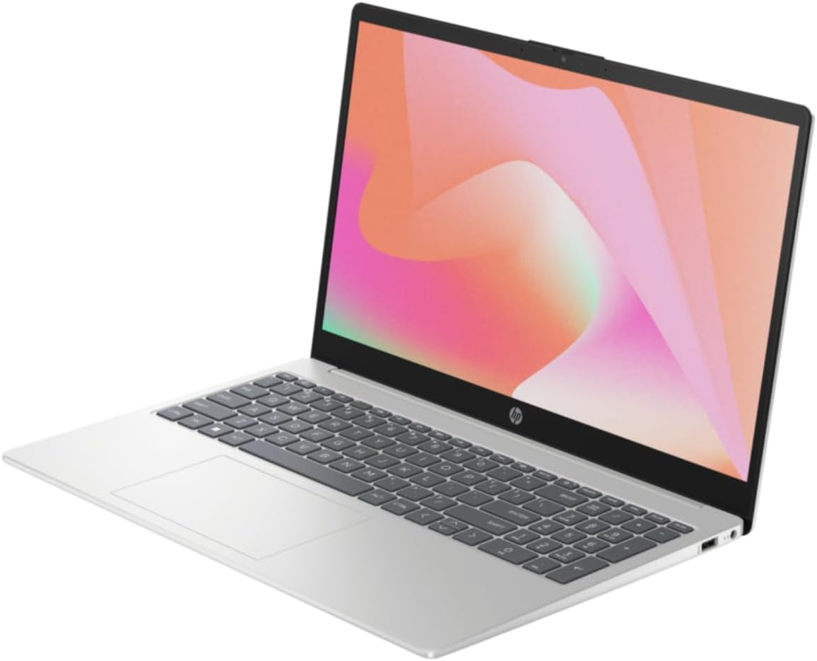 Silver laptop angled view with open screen and dark keyboard deck