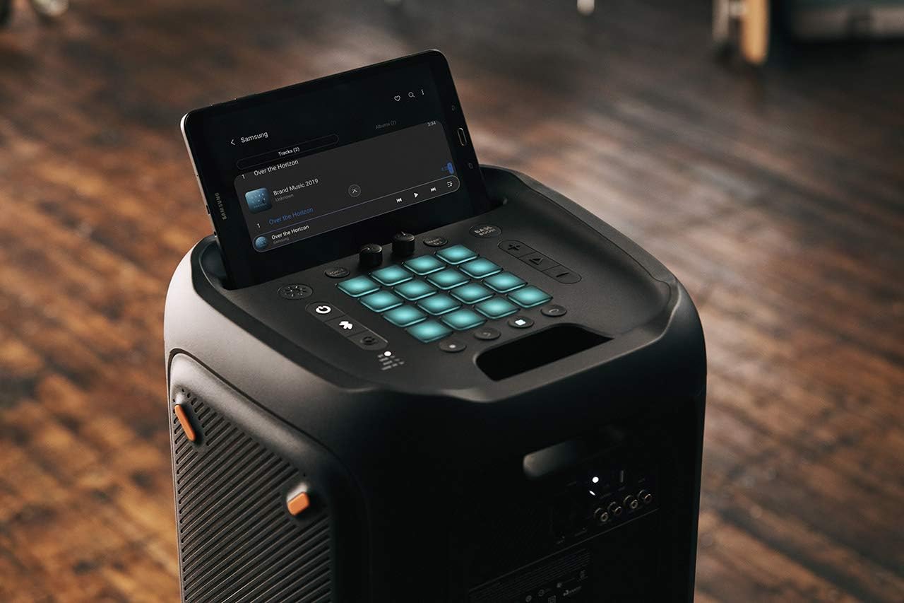 Black portable Bluetooth speaker with top control panel and colorful button grid