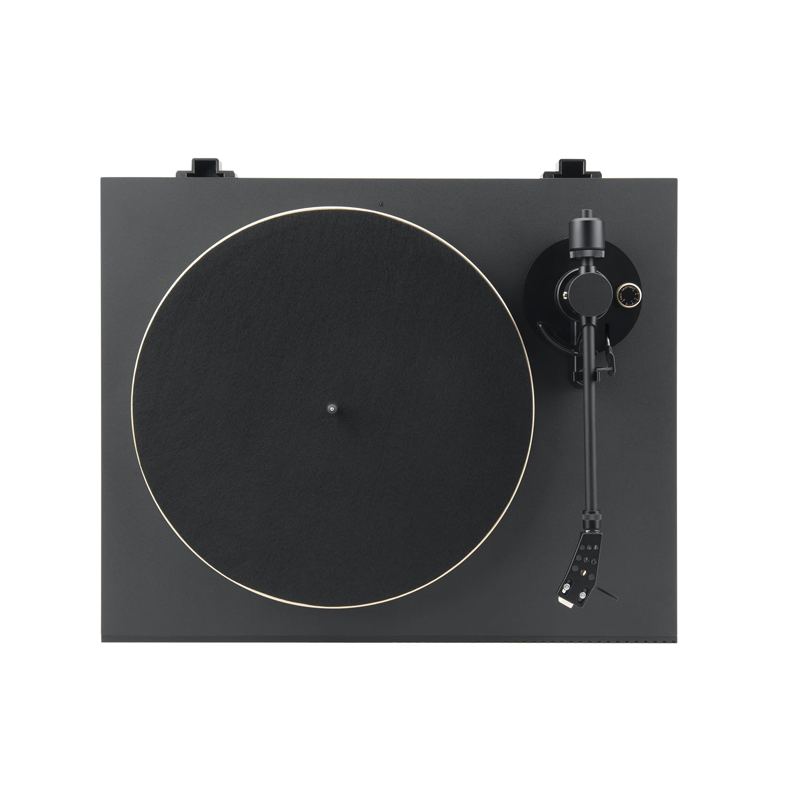 Black turntable top view with gold-edged platter, tonearm on right, and control dial