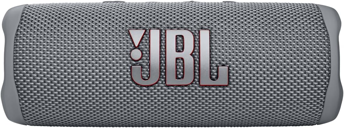 Portable JBL Flip 6 speaker with light gray fabric grille and JBL logo