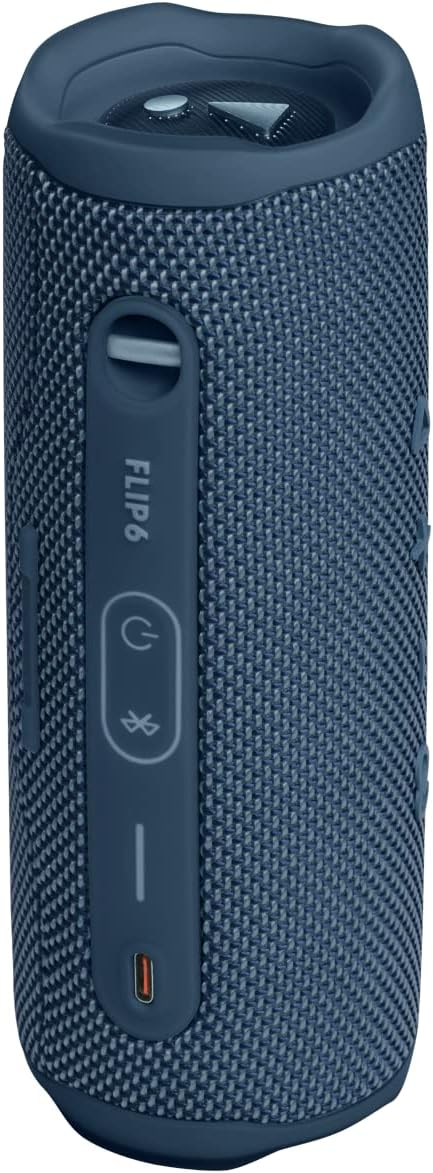 Portable JBL Flip 6 speaker in blue fabric with side control buttons