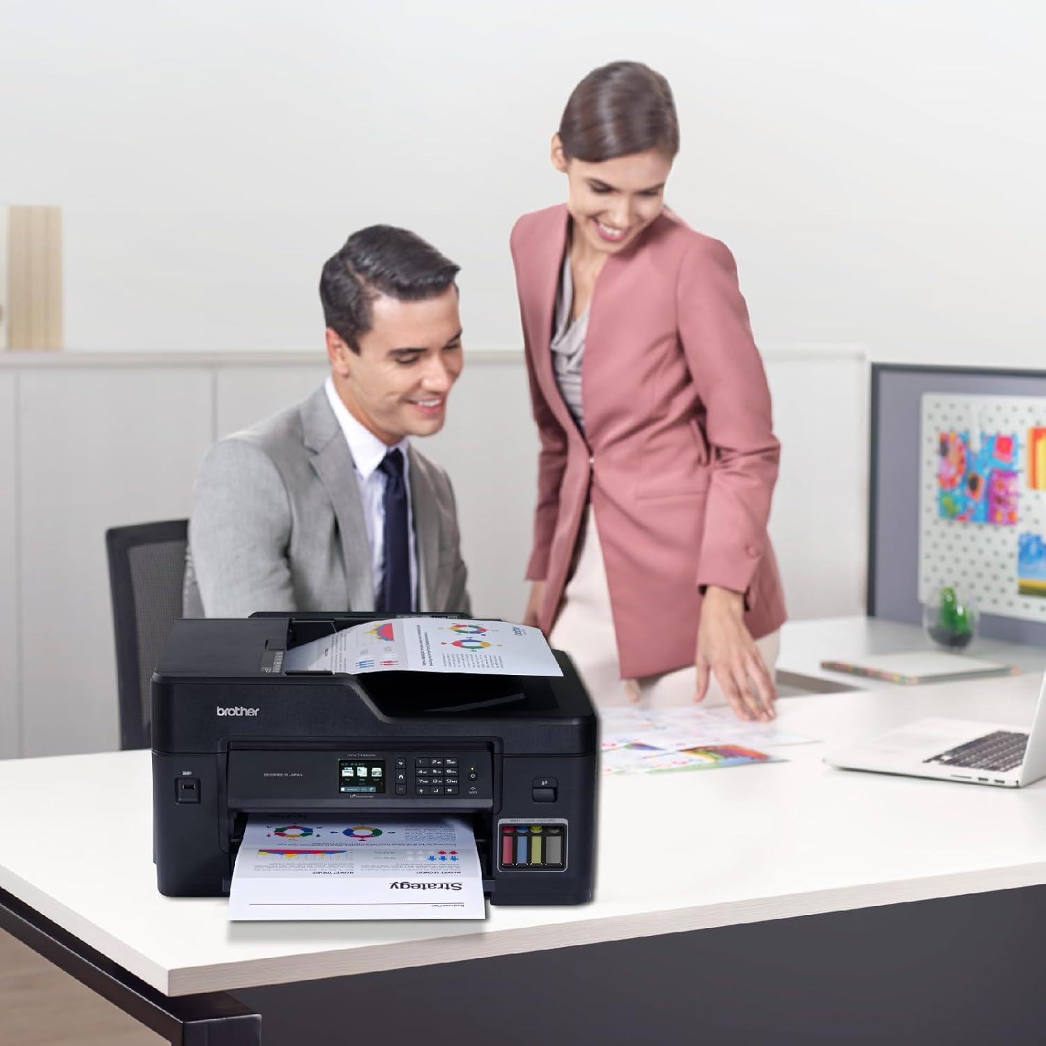 Ink tank multi-function printer with document feeder open on office desk