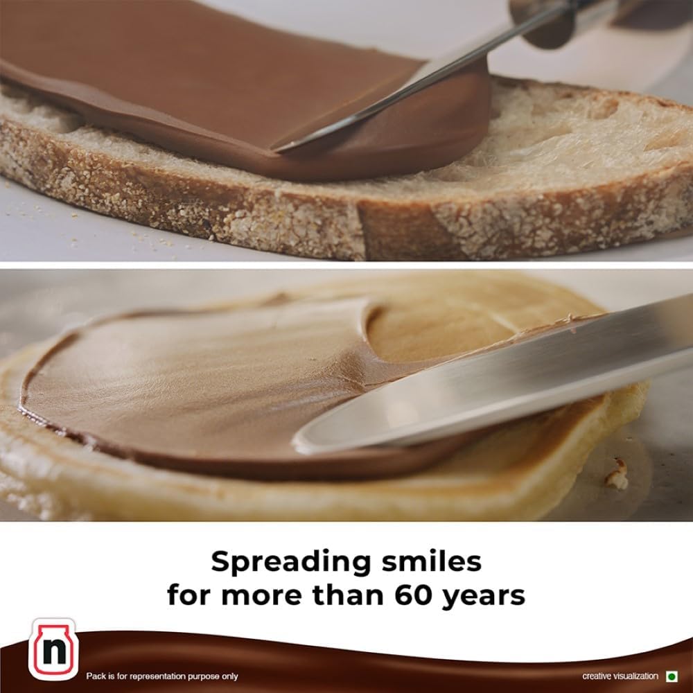 Nutella hazelnut spread spread on sliced bread with a metal knife