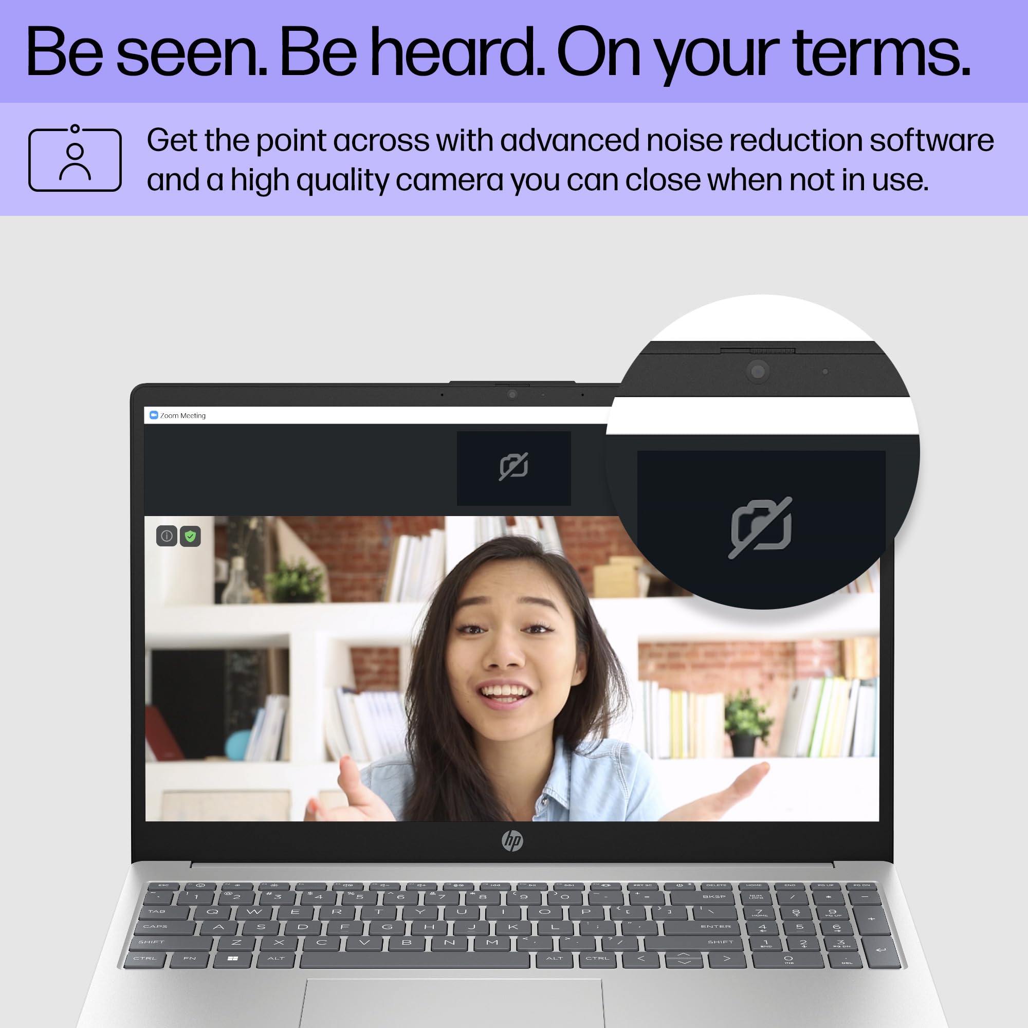 Silver HP laptop open with keyboard visible and webcam area at top bezel