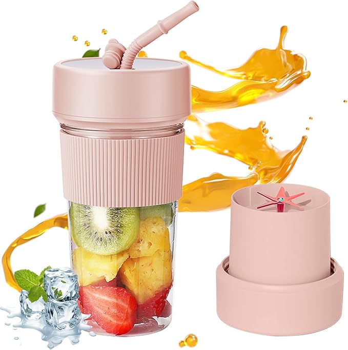 Portable juice cup with pink lid and straw, clear container showing fruit pieces