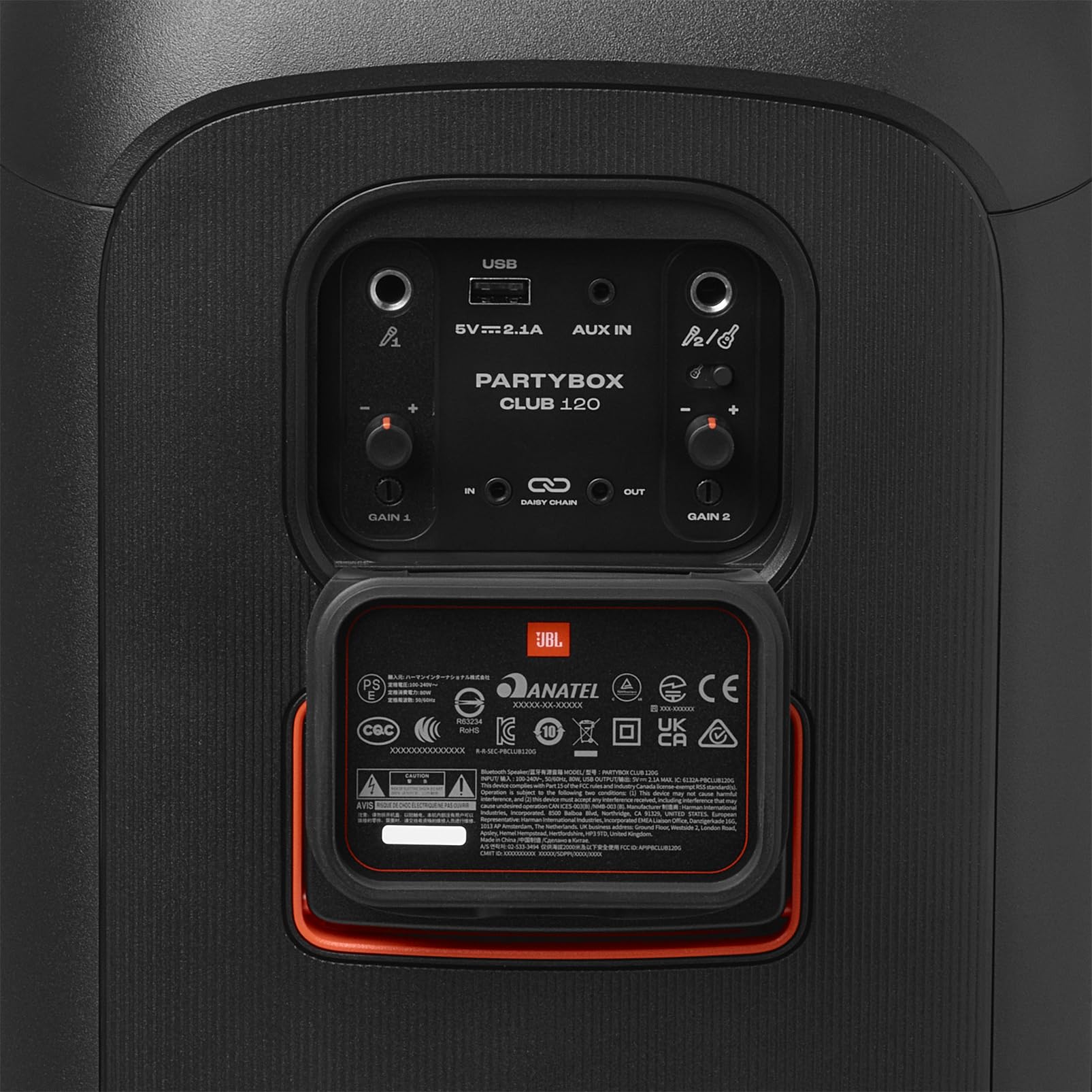 Back of portable Bluetooth speaker with port panel, labels, and orange-accented frame