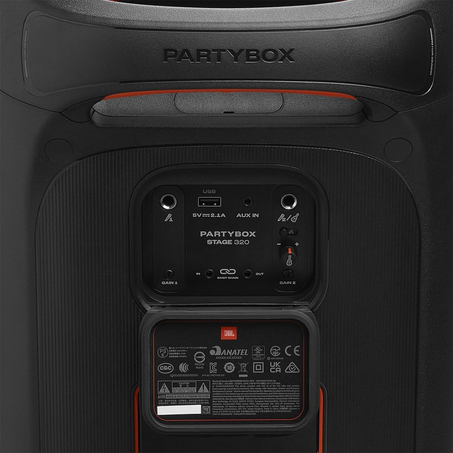 Black JBL PartyBox speaker back with ports, labels, and wiring cover, close-up
