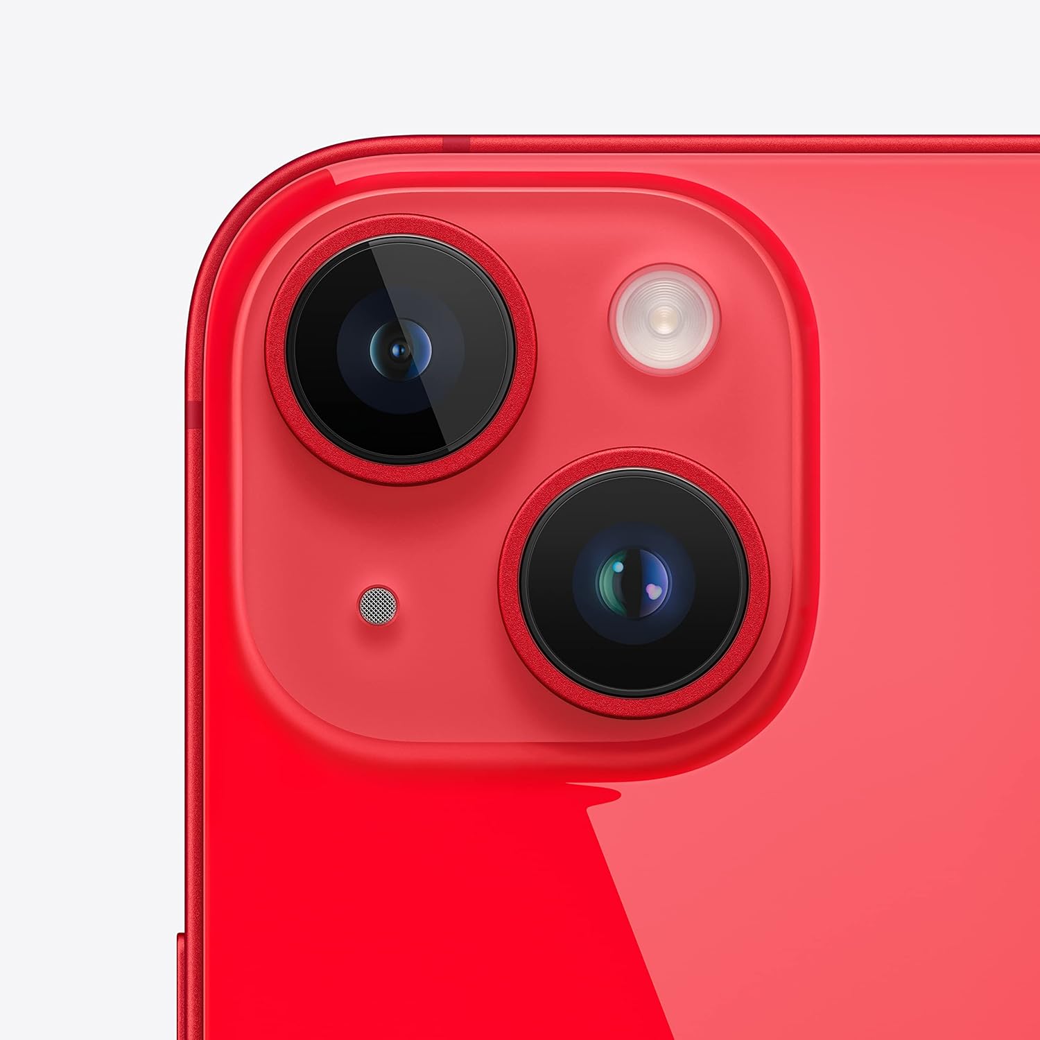 Smartphone close-up of red back with dual rear camera lenses and flash