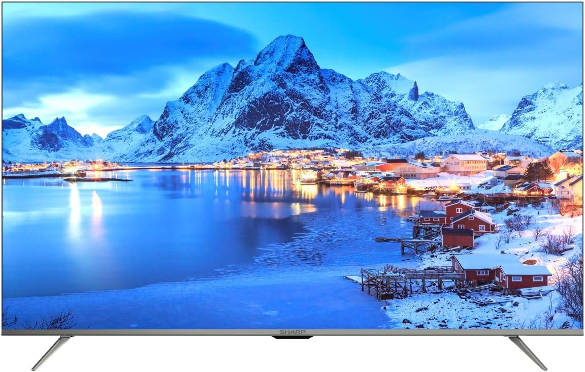 Sharp 55-inch 4K TV with snowy village and mountain scene on screen