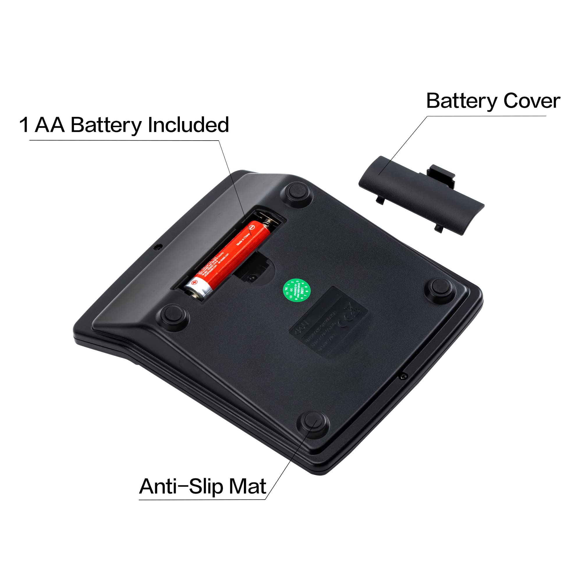 Desktop calculator base with open battery cover, AA battery, and anti-slip mat
