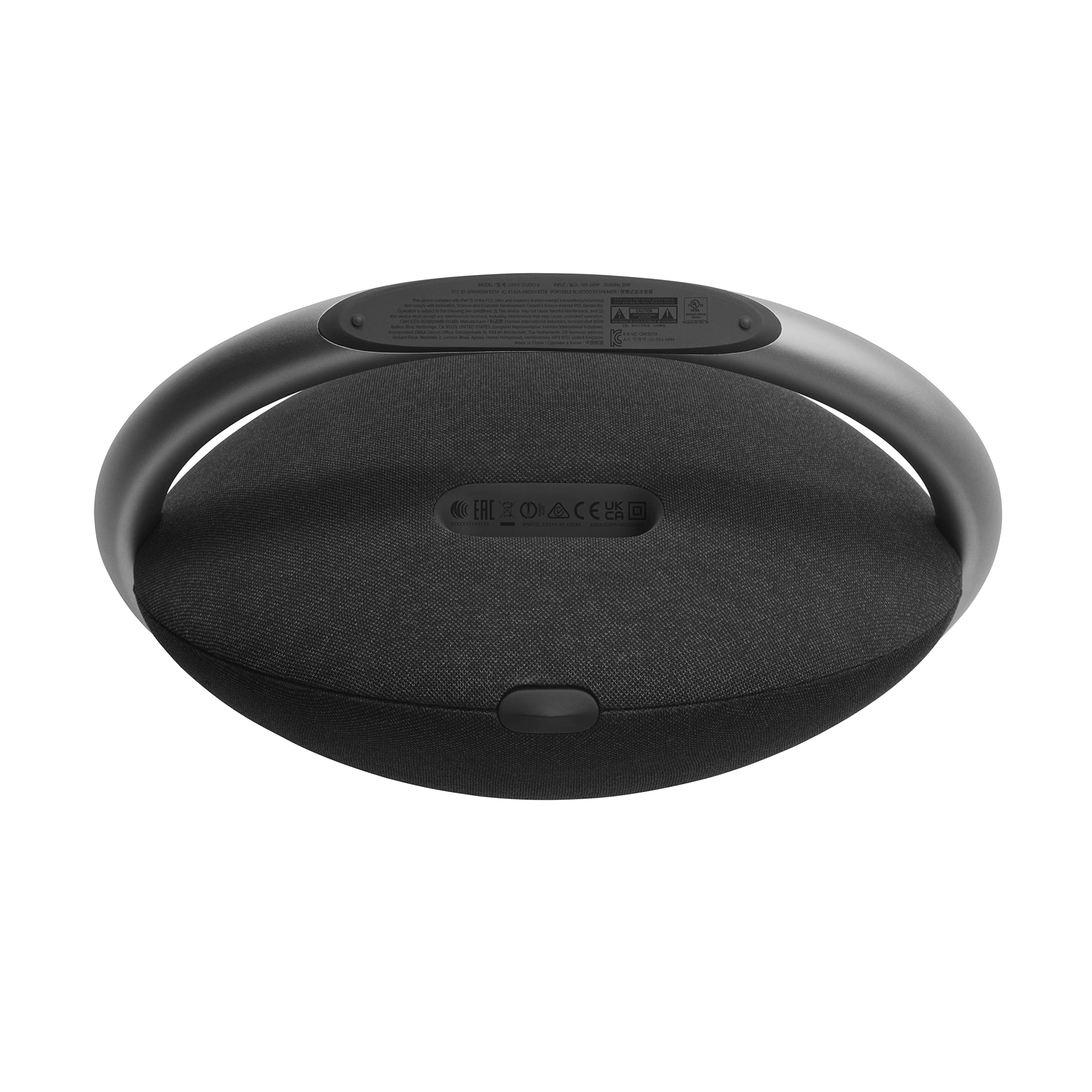 Black portable Bluetooth speaker rear panel with controls and charging cover detail.