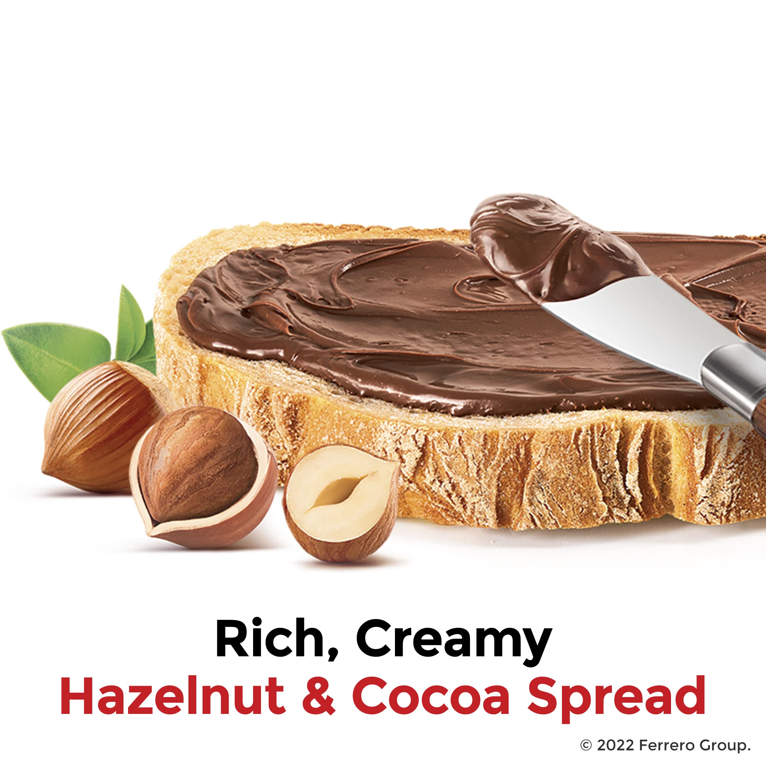 Chocolate hazelnut spread on bread with hazelnuts and spreading knife