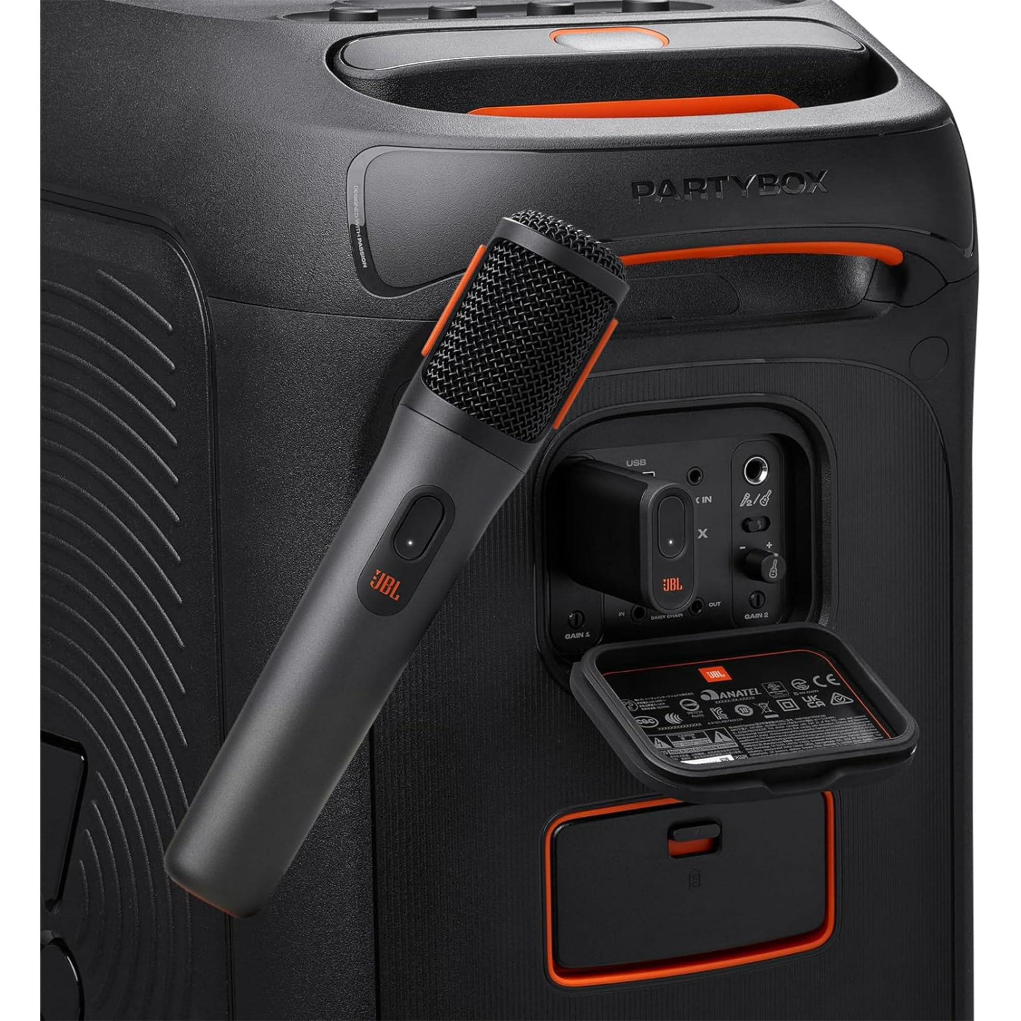 JBL PartyBox speaker back panel with ports and a wireless mic accessory