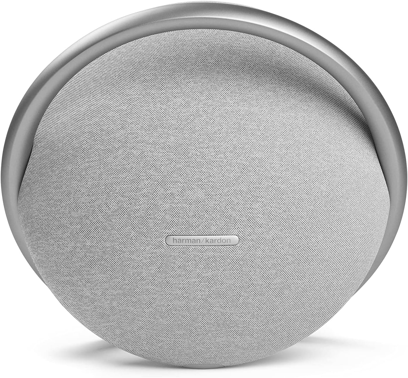 Portable Bluetooth speaker close-up with light grey fabric grille and silver rim