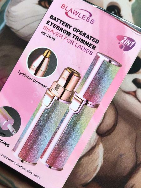 2-in-1 battery eyebrow trimmer kit in pink retail box
