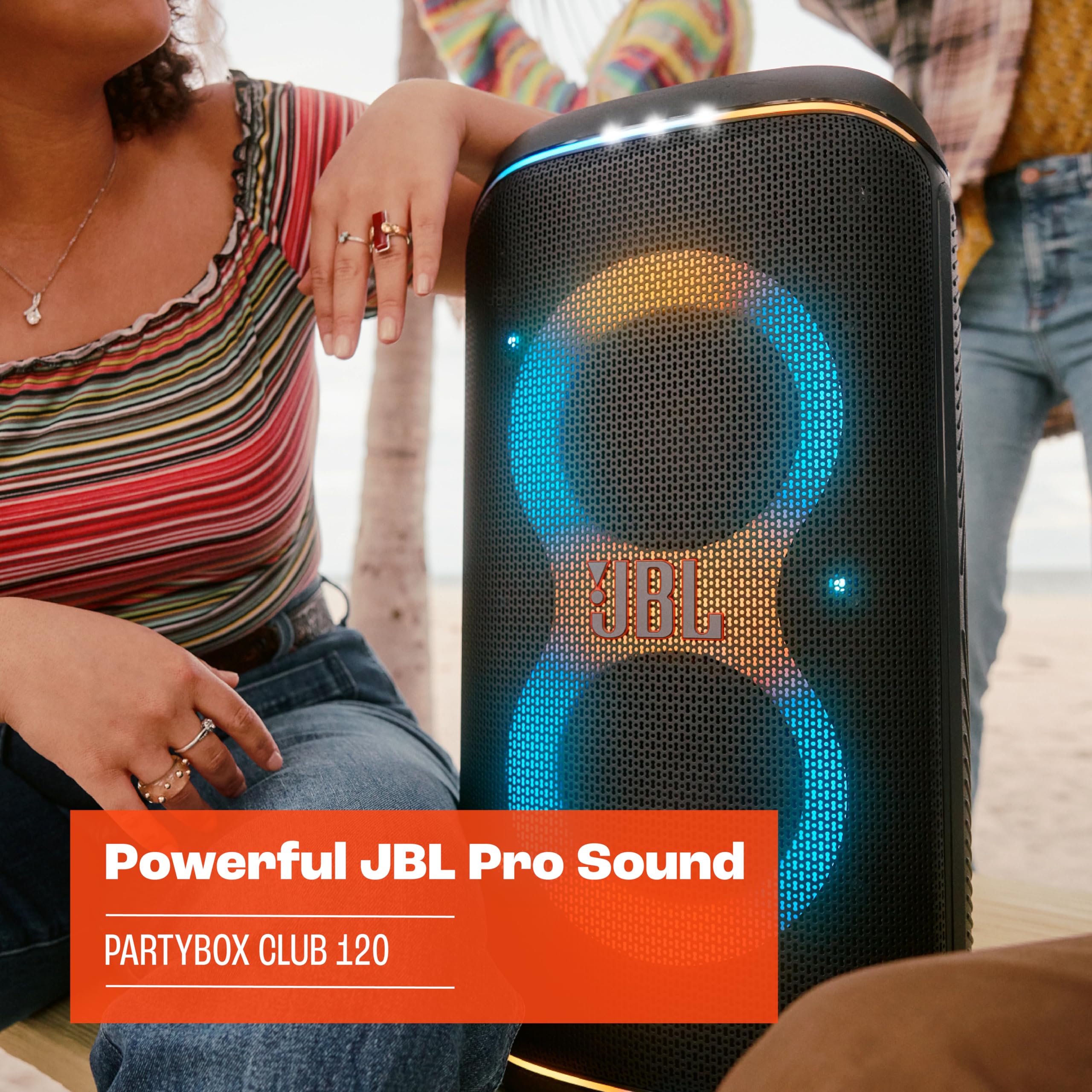 Black JBL portable Bluetooth speaker front with bright blue light rings