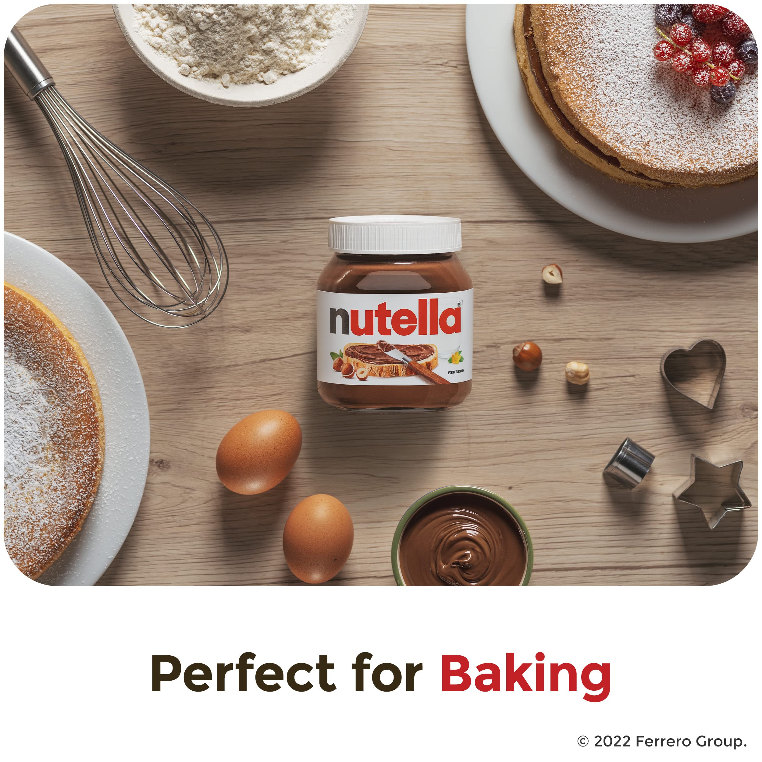 Nutella jar with eggs, flour, and baking ingredients on wooden countertop