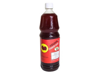 1L strawberry squash drink bottle with dark red liquid and white screw cap