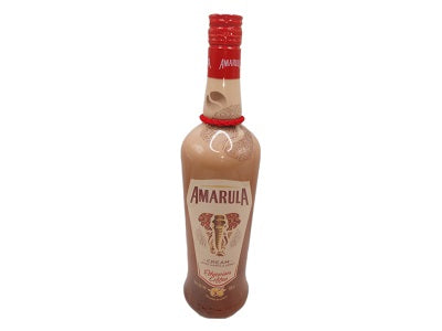 Amarula liqueur bottle, amber glass with red cap and cream label