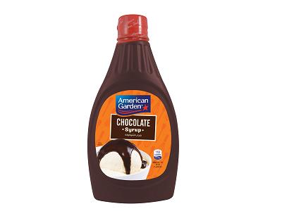 Chocolate syrup bottle with red cap, dark brown, label front view