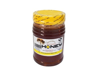BB & Daughters Honey jar, 1 kg, brown honey with yellow lid and label