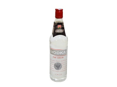 Vodka bottle with red cap and front label marked VODKA, clear glass