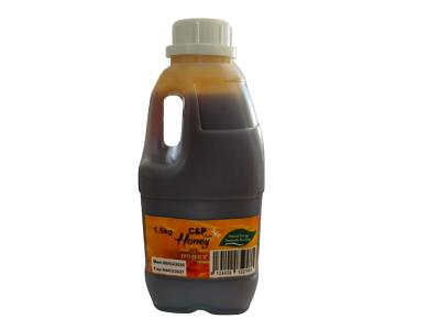 C&P Pure honey bottle, 1.5 kg plastic squeeze container with amber liquid and cap