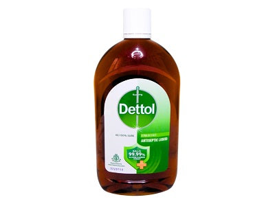 Dettol antiseptic liquid bottle with amber brown liquid and white flip-top cap