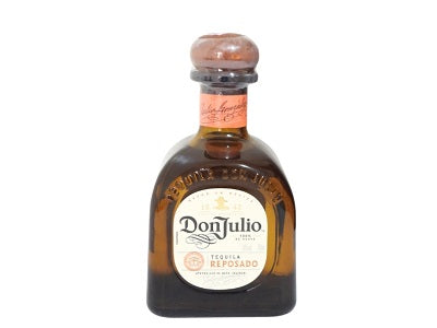 DonJulio reposado tequila bottle with amber glass, label, and cork stopper.