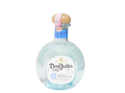 DonJulio blanco tequila bottle, clear glass with frosted light-blue label and cap.