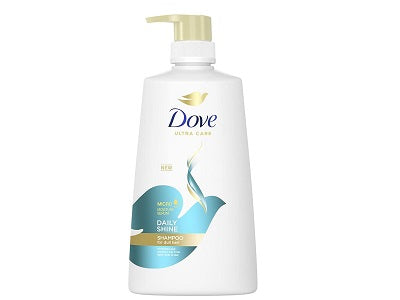 Dove shampoo bottle with pump dispenser, white body and teal label