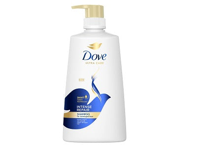 Dove shampoo bottle with pump dispenser, white body and blue label