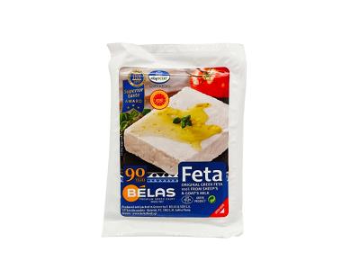Vacuum-sealed feta cheese, 200 g package, white blocks and blue label.