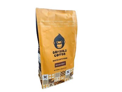 Coffee beans bag in brown kraft with blue Gorilla Coffee logo, front view
