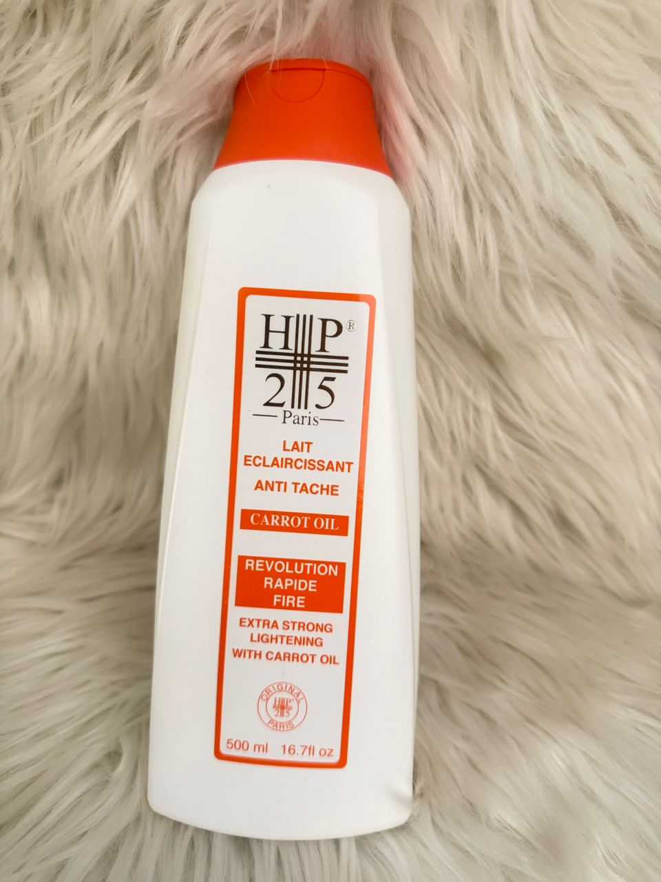 HTiP 2115 Paris anti-stain carrot oil brightening milk, white bottle with orange cap