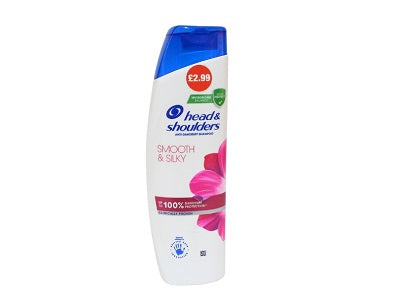 Head & Shoulders shampoo bottle with blue cap and pink floral label