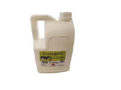 Off-white plastic jug with side handle and top cap, label facing right