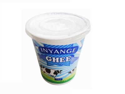 Inyange pure ghee tub, 1 kg, blue-and-white label, plastic container with lid.