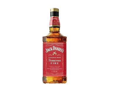 Jack Daniel's Tennessee Fire whiskey bottle, amber glass with red label