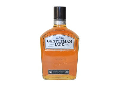 Gentleman Jack whiskey bottle, amber glass with neck foil and front label