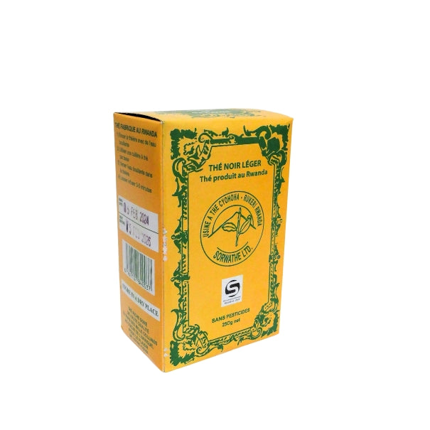 Tea box carton with green border, portrait emblem, and yellow background