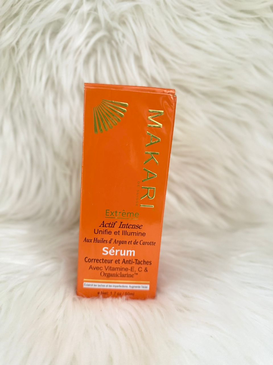 Makari serum sachet in orange packaging