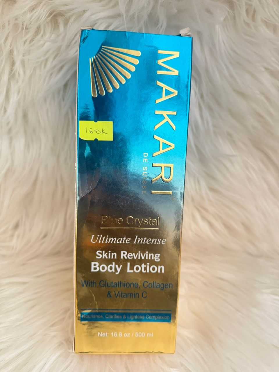 Makari skin reviving body lotion box, blue and gold label