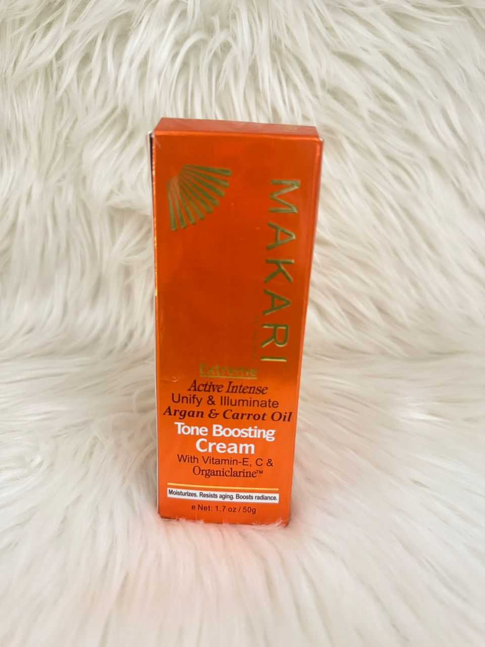 Makari tone boosting cream in orange box, net wt 1.7 oz (50 g)